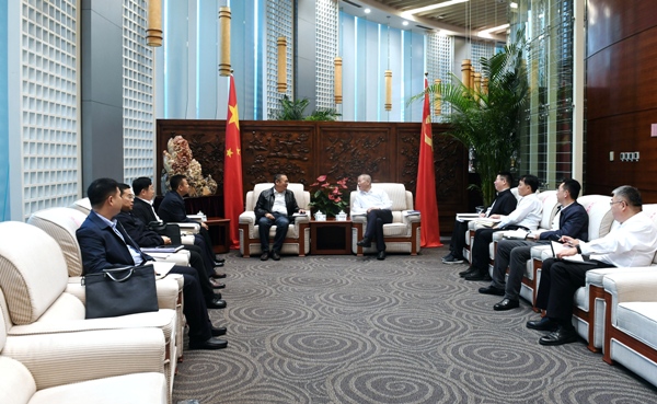 郭铭群董事长会见中国华电天津分公司执行董事王毅